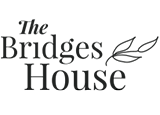 stylized Bridges House logo with leaf